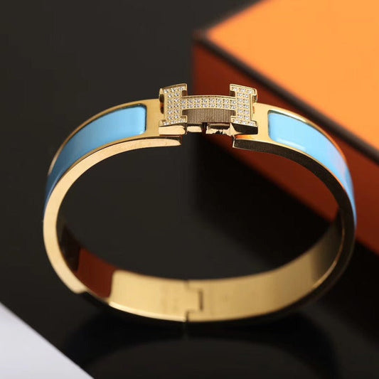 [LUXORA]H CLOUD BLUE ARMBAND GOLD DIAMANT