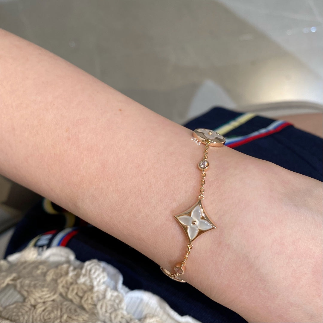[LUXORA]STAR AND SUN 4 MOTIF WHITE MOP PINK GOLD BRACELET
