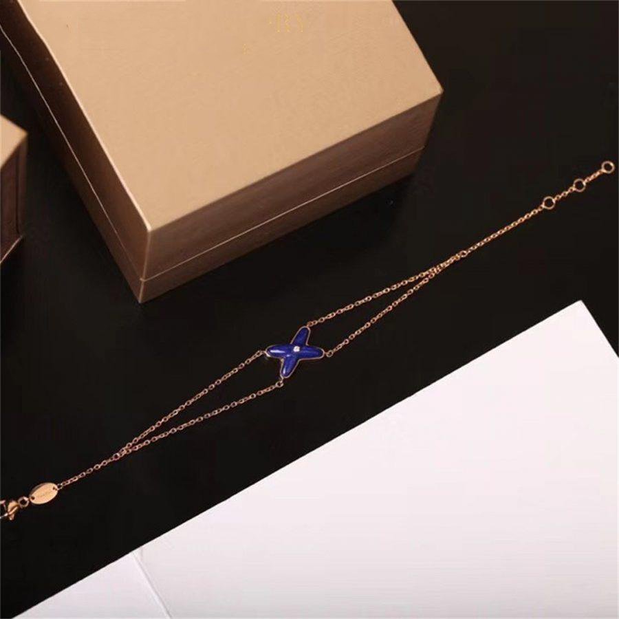 [LUXORA]Hollow Design Four-Leaf Clover Flower Shape Ring